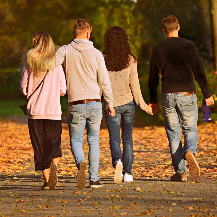 2 couples walking to keep fit in a park. Credit: https://pixabay.com/en/users/MabelAmber-1377835/