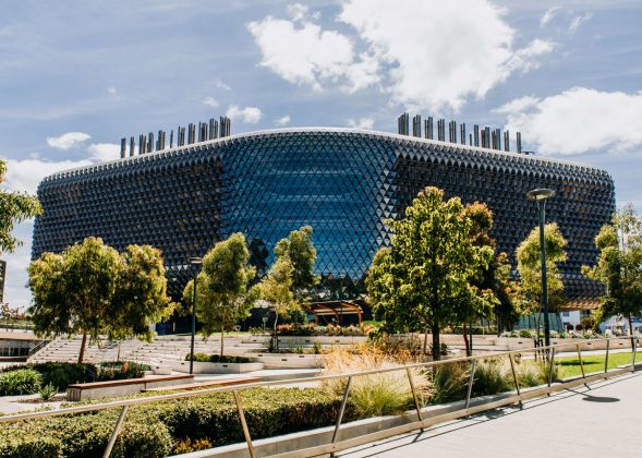 Large campus building of SAHMRI with trees