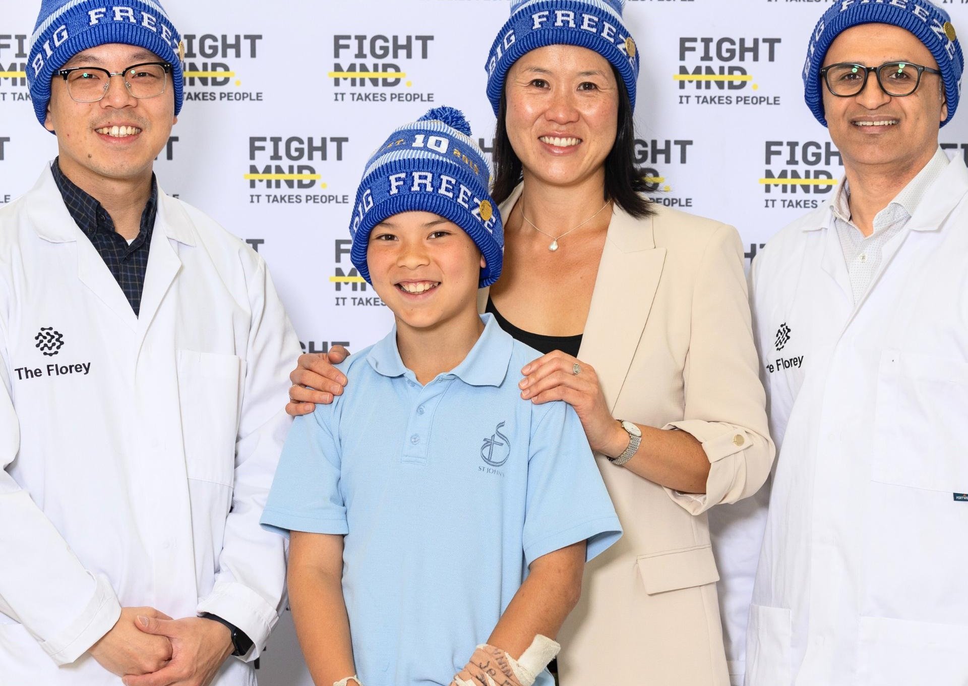 Florey's Dr Alan Yu and Associate Professor Fazel Shabanpoor with Mel and Archie, wife and son of FightMND co-founder Dr Ian Davis