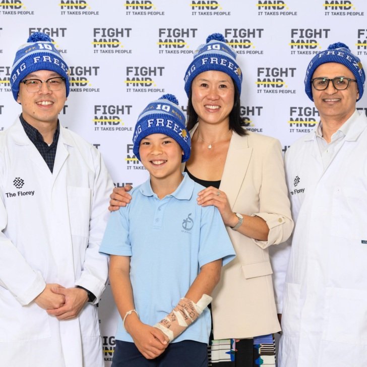 Florey's Dr Alan Yu and Associate Professor Fazel Shabanpoor with Mel and Archie, wife and son of FightMND co-founder Dr Ian Davis