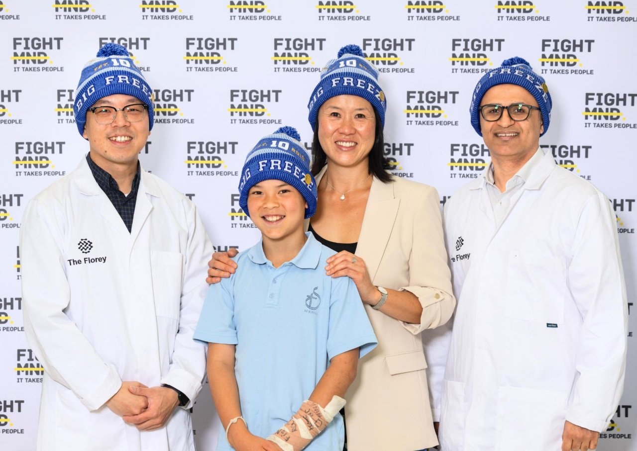 Florey's Dr Alan Yu and Associate Professor Fazel Shabanpoor with Mel and Archie, wife and son of FightMND co-founder Dr Ian Davis