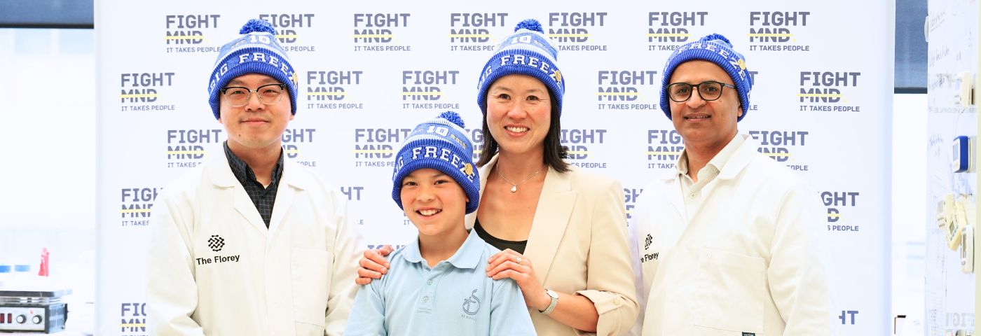 Florey's Dr Alan Yu and Associate Professor Fazel Shabanpoor with Mel and Archie, wife and son of FightMND co-founder Dr Ian Davis