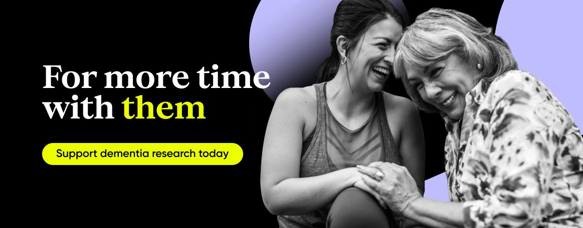 Two women holding hands and laughing with the heading For more time with them and a button that reads Support dementia research today.