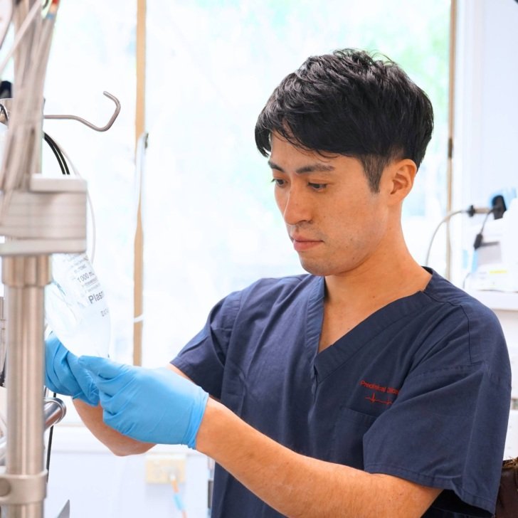 Dr Taku Furukawa and a heart-lung machine